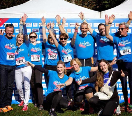 group of ADP associates wearing blue T-shirts