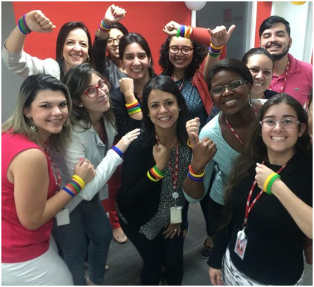 group of ADP associates wearing colorful bracelets