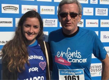 young woman and elderly man; participating in 'enfants sans cancer' event