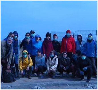 group of ADP associates wearing face masks and warm jackets