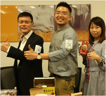 three ADP associates giving thumbs up with their hands