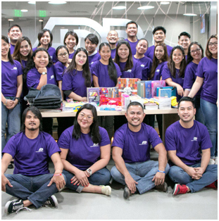 group of ADP associates in purple T-shirts