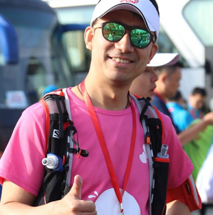 ADP associate wearing pink T-shirt and sunglasses