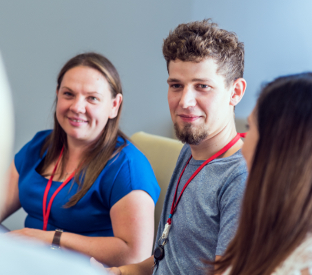 small team of ADP associates engaged in conversation