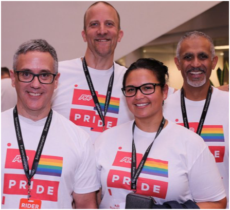 team of ADP associates wearing ADP Pride T-shirts