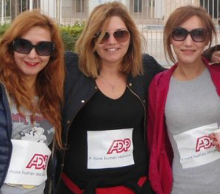 three female ADP associates wearing sunglasses